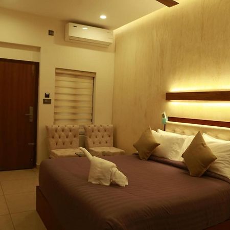 Casa Orchid Hotel Alappuzha Buitenkant foto