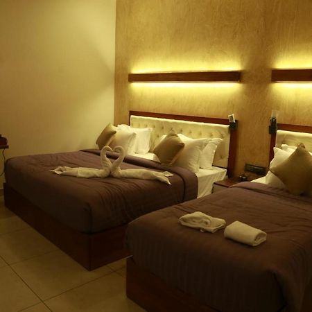 Casa Orchid Hotel Alappuzha Buitenkant foto