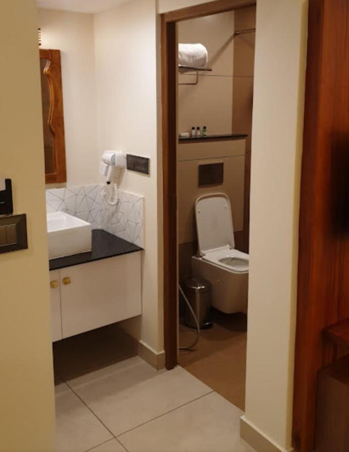 Casa Orchid Hotel Alappuzha Buitenkant foto