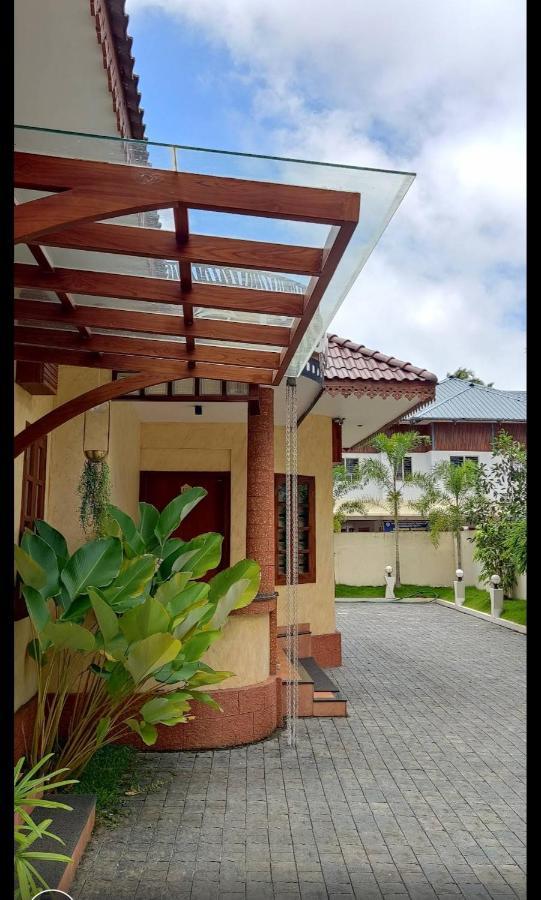 Casa Orchid Hotel Alappuzha Buitenkant foto