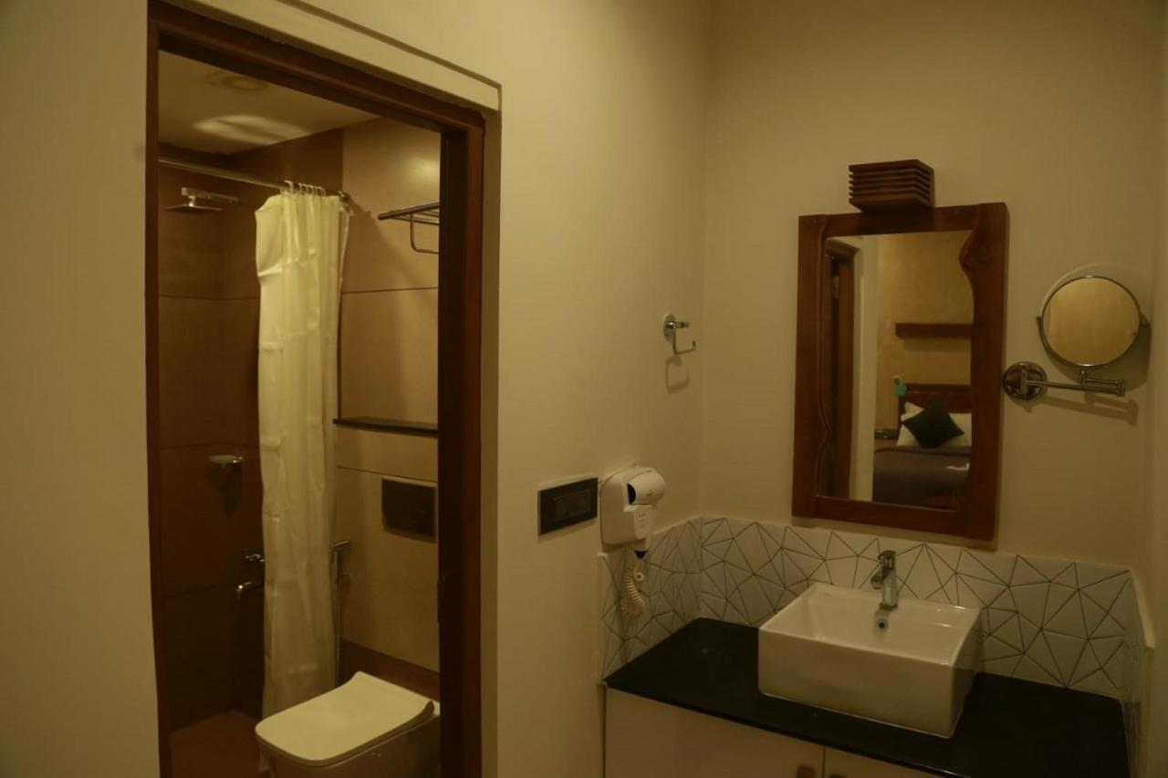 Casa Orchid Hotel Alappuzha Buitenkant foto