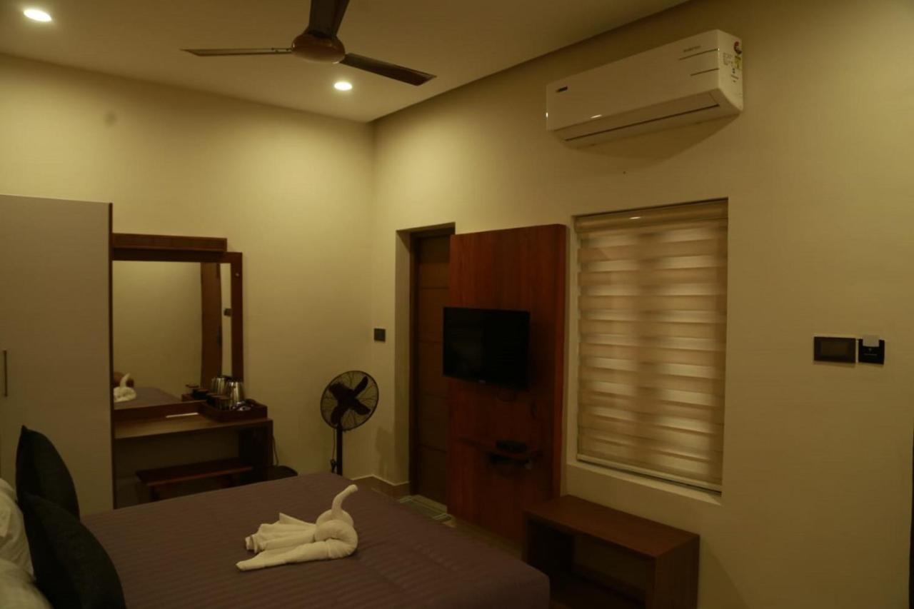 Casa Orchid Hotel Alappuzha Buitenkant foto