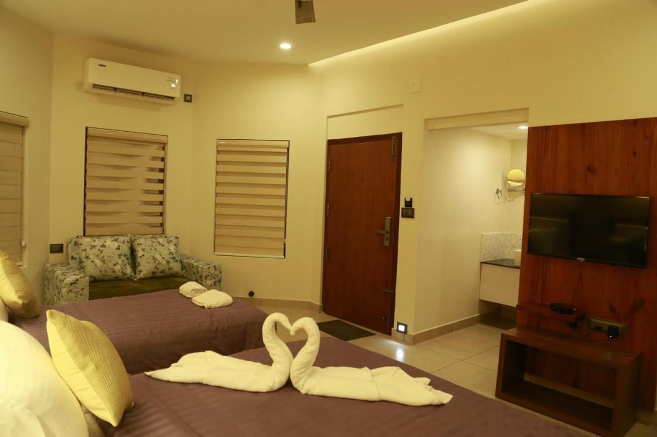 Casa Orchid Hotel Alappuzha Buitenkant foto