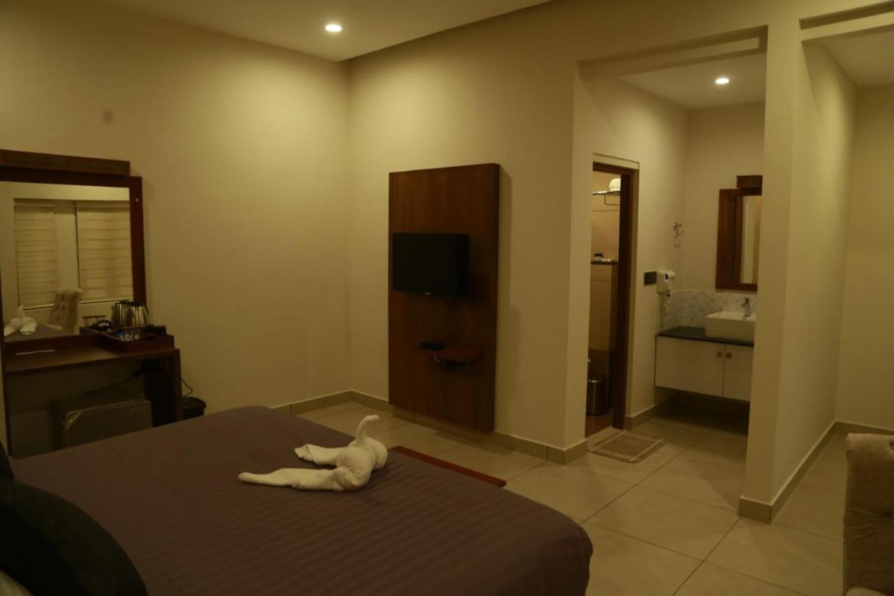 Casa Orchid Hotel Alappuzha Buitenkant foto